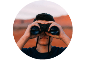 Man looking through binoculars, representing insight