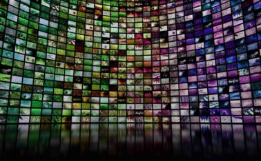 streaming of Colorful giant multimedia video and image wall, representing the digital transformation that is taking place