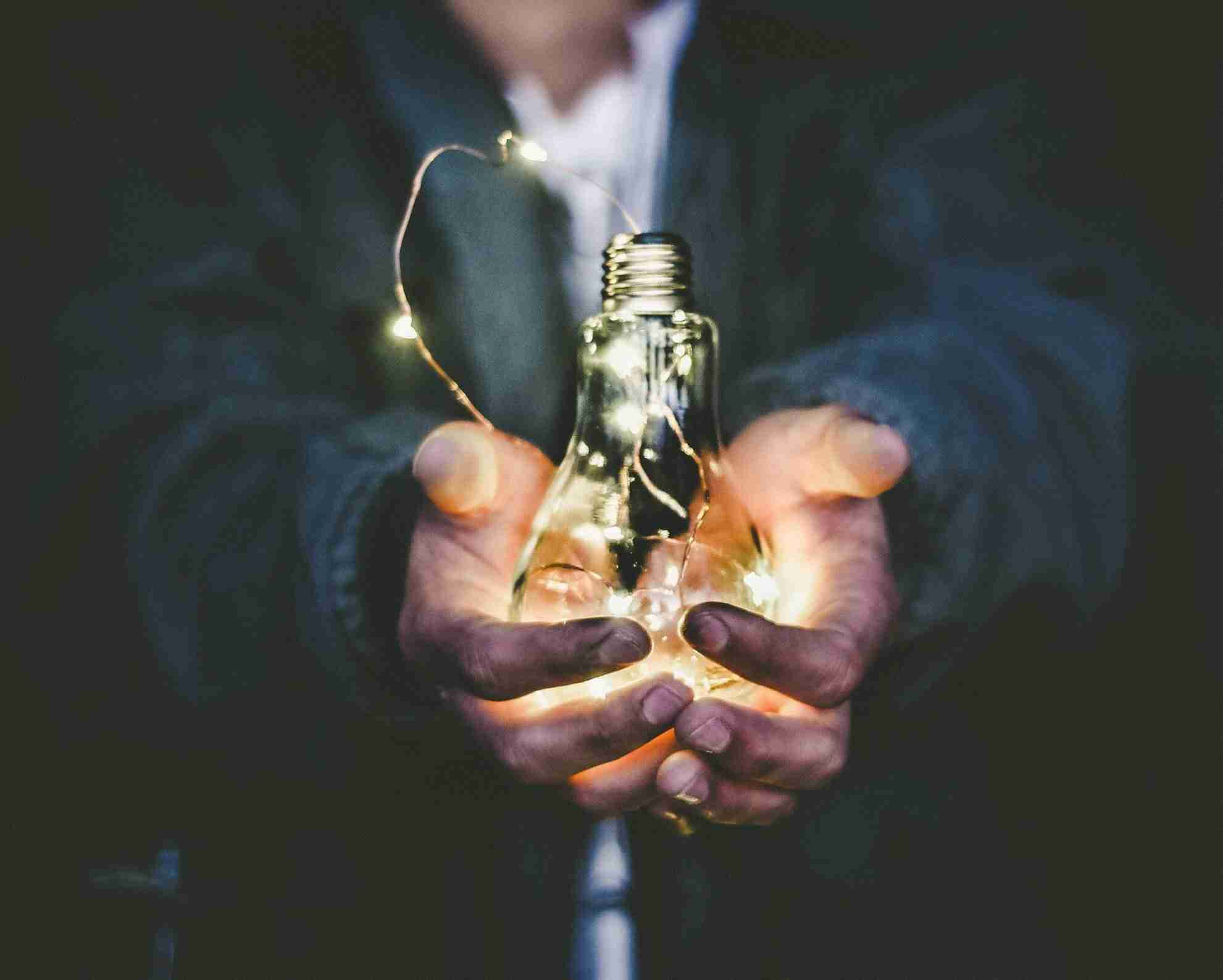 Bulb with lights representing innovation strategy