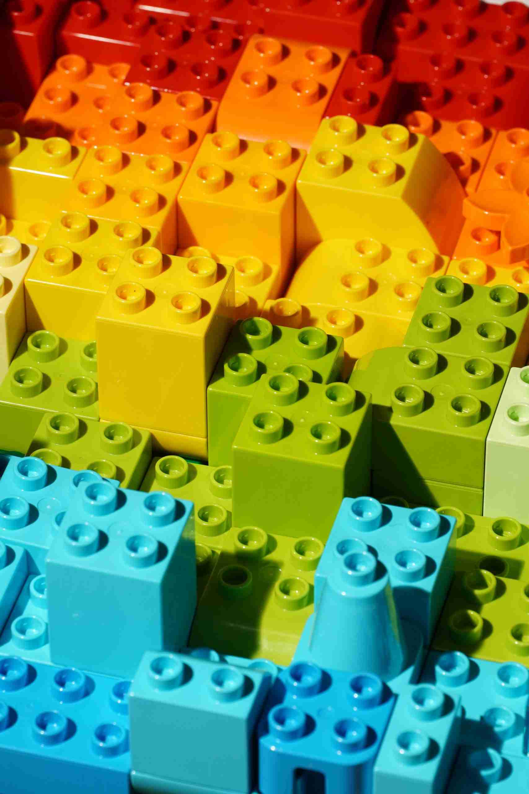 An image of Duplo Blocks representing how you must test and experiment as part of your  Business Strategy